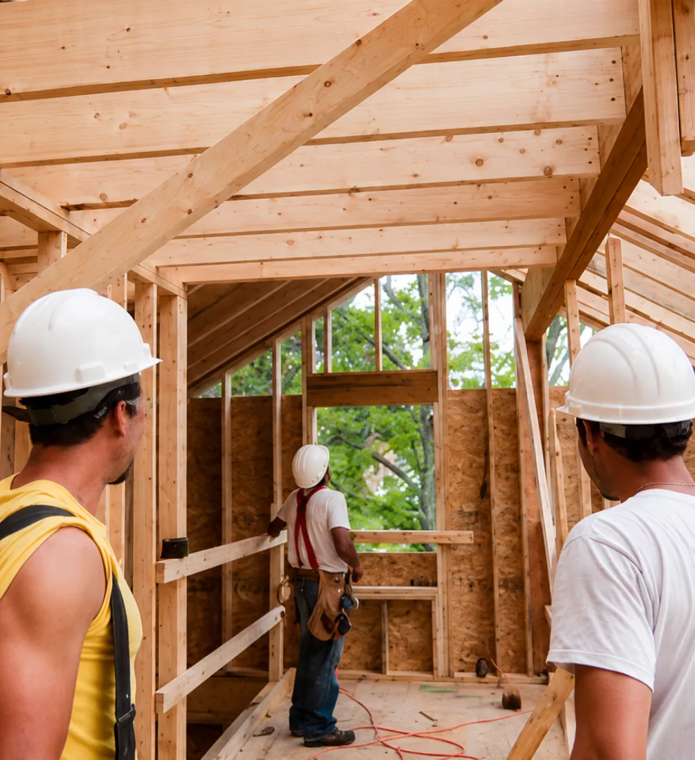 Construction team reviewing wood framing for residential and commercial building projects in Los Angeles