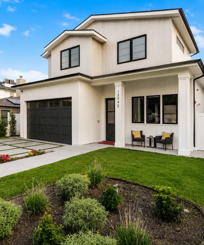 Home Wow Pro residential construction project in Los Angeles showing a modern home exterior with landscaping and quality building benefits