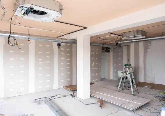 Home Wow Pro commercial interior buildout in Los Angeles with drywall installation, HVAC ductwork, electrical rough-in, and professional construction preparation